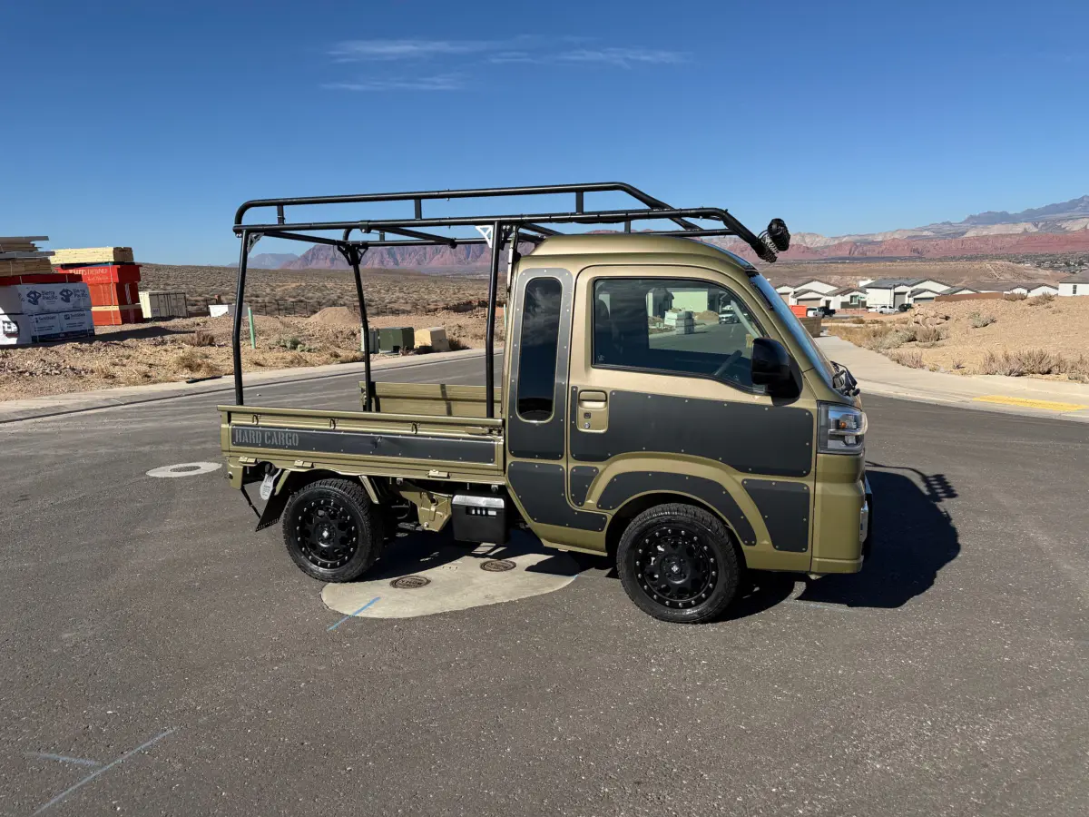 2023 Daihatsu Hijet Jumbo, a black off-road Kei Truck, for sale at Mini Monsters USA in St. George, UT (photo 1 of 12)