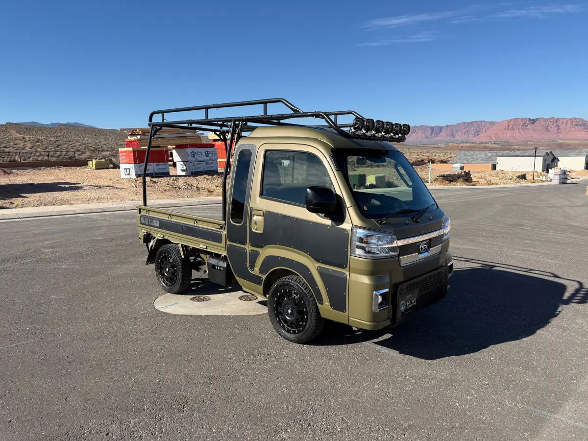 2023 Daihatsu Hijet Jumbo, a black off-road Kei Truck, for sale at Mini Monsters USA in St. George, UT (photo 4 of 12)