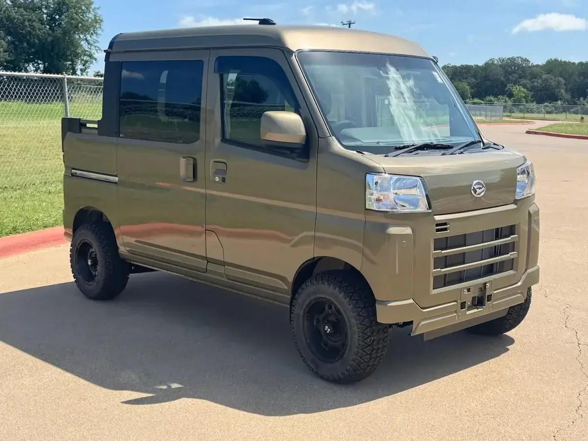 2024 Daihatsu Hijet Deck Van, a khaki green off-road Kei Truck, for sale at Weatherford Mini Trucks in Weatherford, TX (photo 1 of 12)