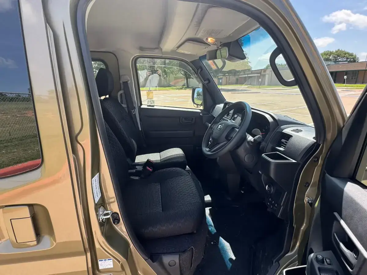 2024 Daihatsu Hijet Deck Van, a khaki green off-road Kei Truck, for sale at Weatherford Mini Trucks in Weatherford, TX (photo 9 of 12)
