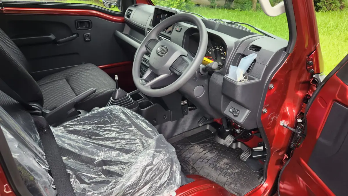 2024 Daihatsu Hijet Extreme, a red off-road Kei Truck, for sale at Mini Monsters USA in St. George, UT (photo 10 of 12)