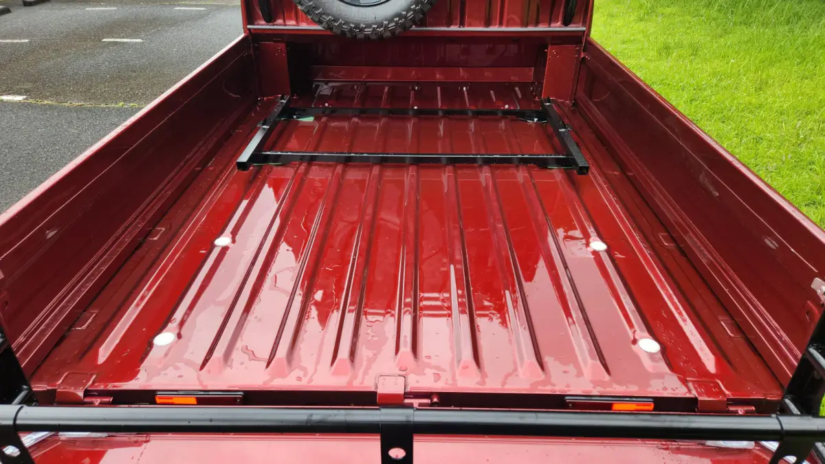 2024 Daihatsu Hijet Extreme, a red off-road Kei Truck, for sale at Mini Monsters USA in St. George, UT (photo 3 of 12)