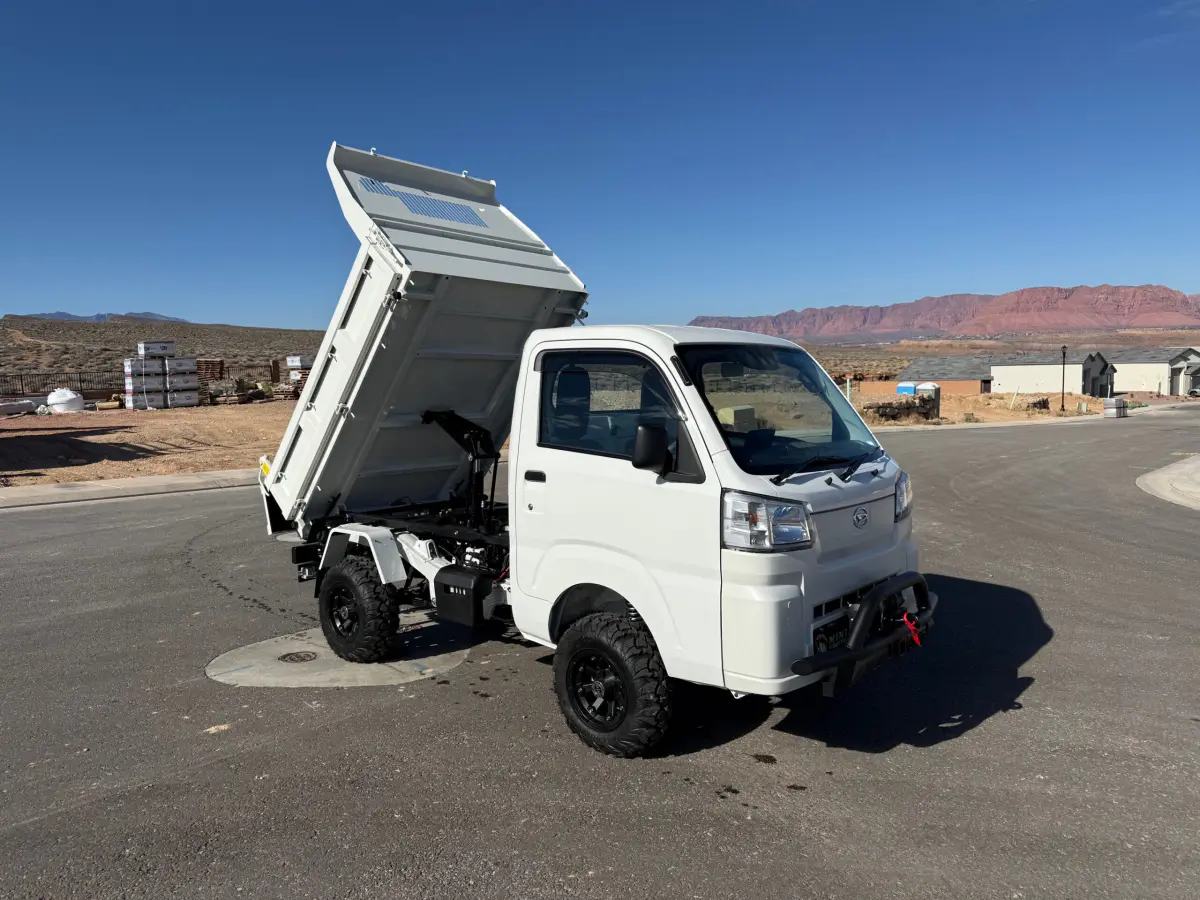 2024 Daihatsu Hijet HD Dump, a whiteout off-road Kei Truck, for sale at Mini Monsters USA in St. George, UT (photo 1 of 12)