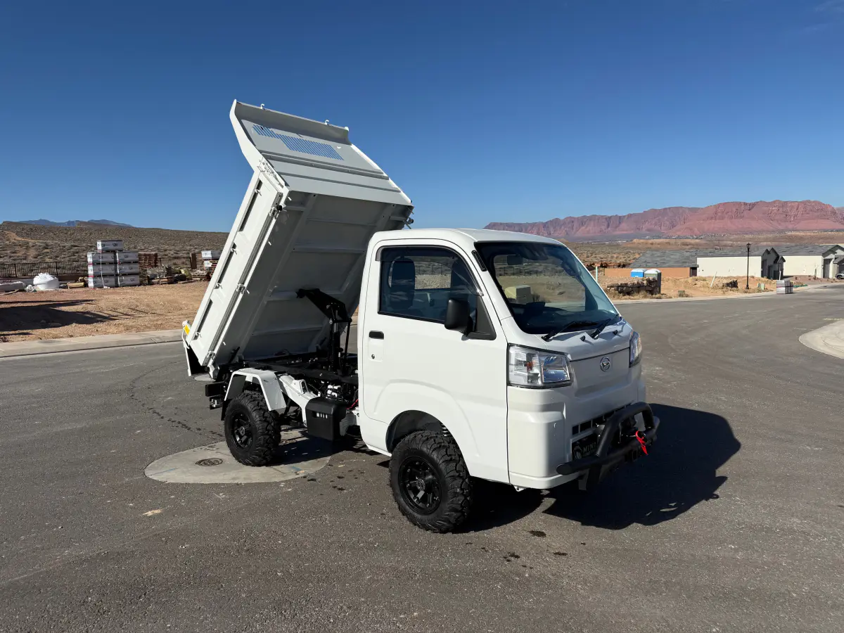 2024 Daihatsu Hijet HD Dump, a whiteout off-road Kei Truck, for sale at Mini Monsters USA in St. George, UT (photo 2 of 12)