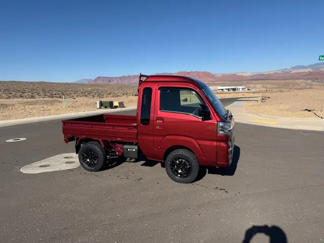 2024 Daihatsu Hijet Jumbo, a red off-road Kei Truck, for sale at Mini Monsters USA in St. George, UT (photo 2 of 12)