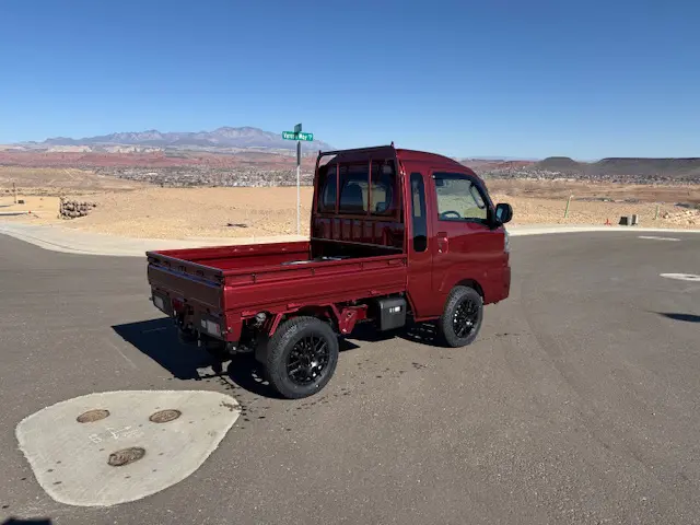 2024 Daihatsu Hijet Jumbo, a red off-road Kei Truck, for sale at Mini Monsters USA in St. George, UT (photo 3 of 12)