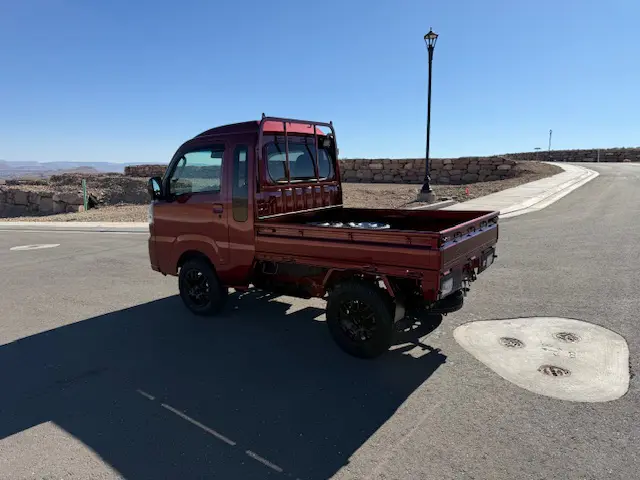 2024 Daihatsu Hijet Jumbo, a red off-road Kei Truck, for sale at Mini Monsters USA in St. George, UT (photo 4 of 12)