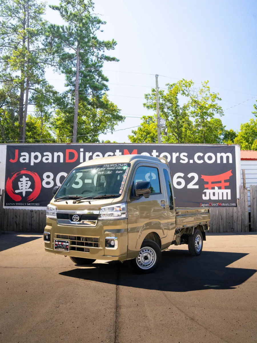 2024 Daihatsu Hijet, a green off-road Kei Truck, for sale at Japan Direct Motors in Irmo, SC (photo 1 of 12)