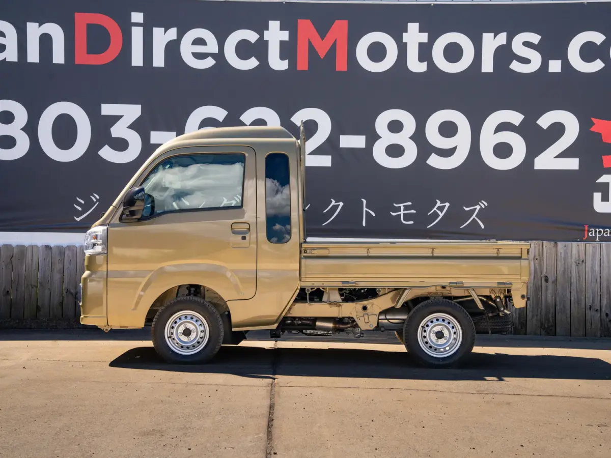 2024 Daihatsu Hijet, a green off-road Kei Truck, for sale at Japan Direct Motors in Irmo, SC (photo 10 of 12)