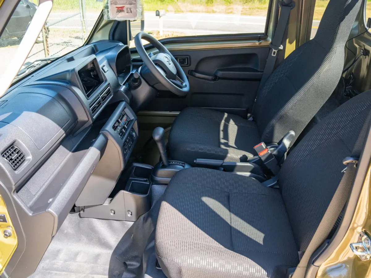 2024 Daihatsu Hijet, a green off-road Kei Truck, for sale at Japan Direct Motors in Irmo, SC (photo 12 of 12)