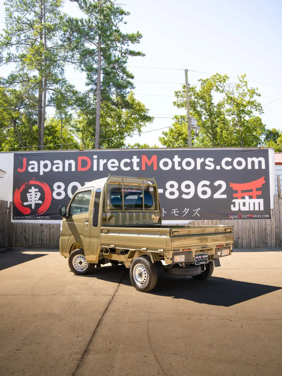 2024 Daihatsu Hijet, a green off-road Kei Truck, for sale at Japan Direct Motors in Irmo, SC (photo 2 of 12)