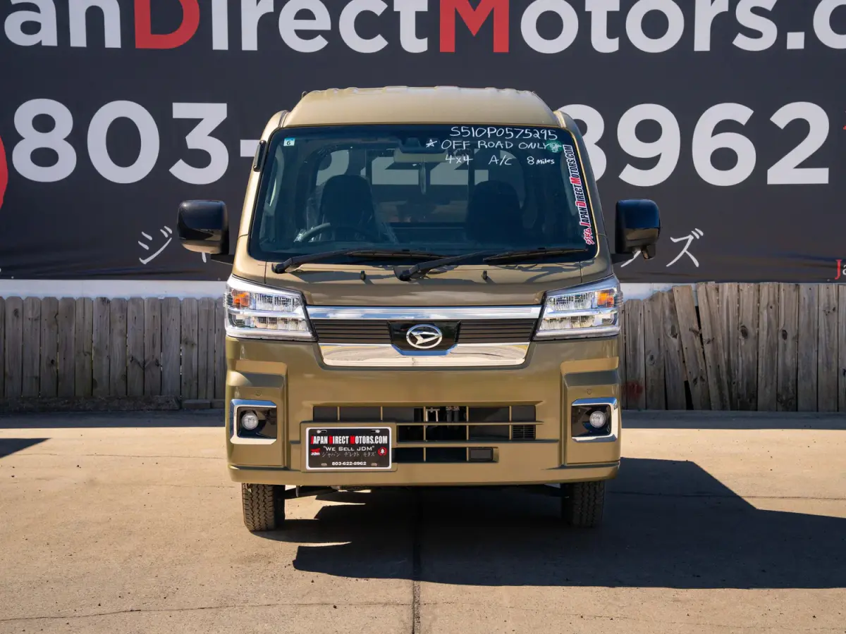 2024 Daihatsu Hijet, a green off-road Kei Truck, for sale at Japan Direct Motors in Irmo, SC (photo 4 of 12)