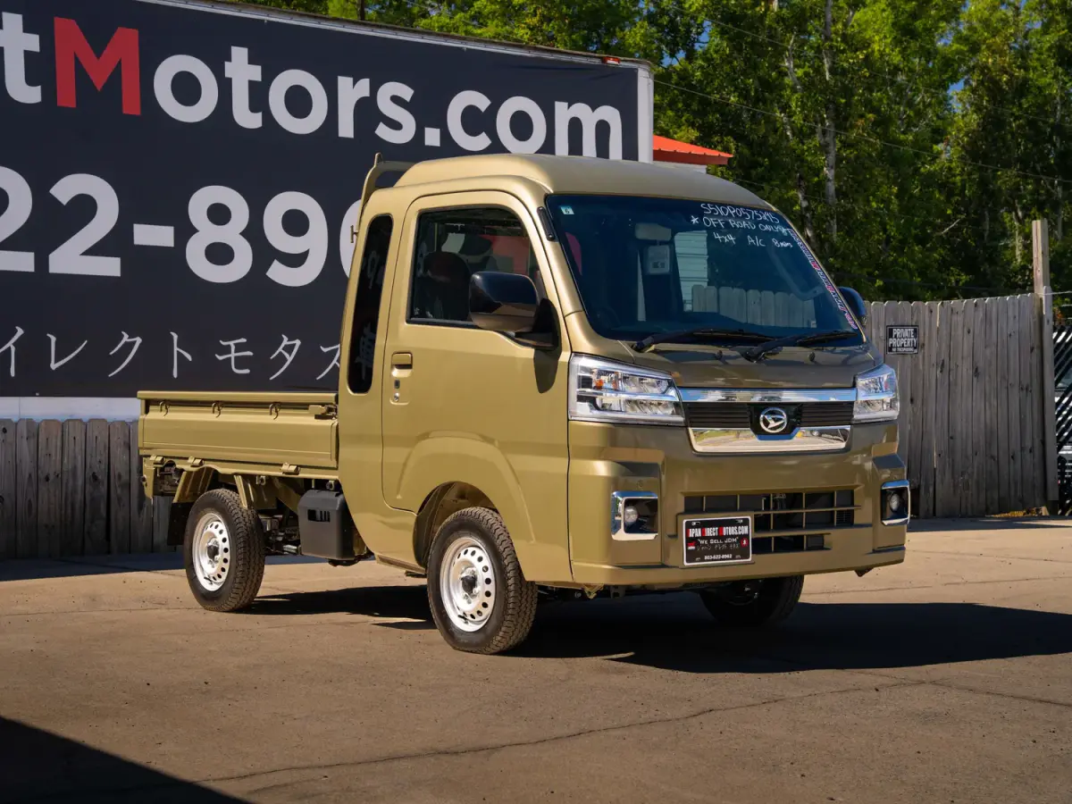 2024 Daihatsu Hijet, a green off-road Kei Truck, for sale at Japan Direct Motors in Irmo, SC (photo 5 of 12)