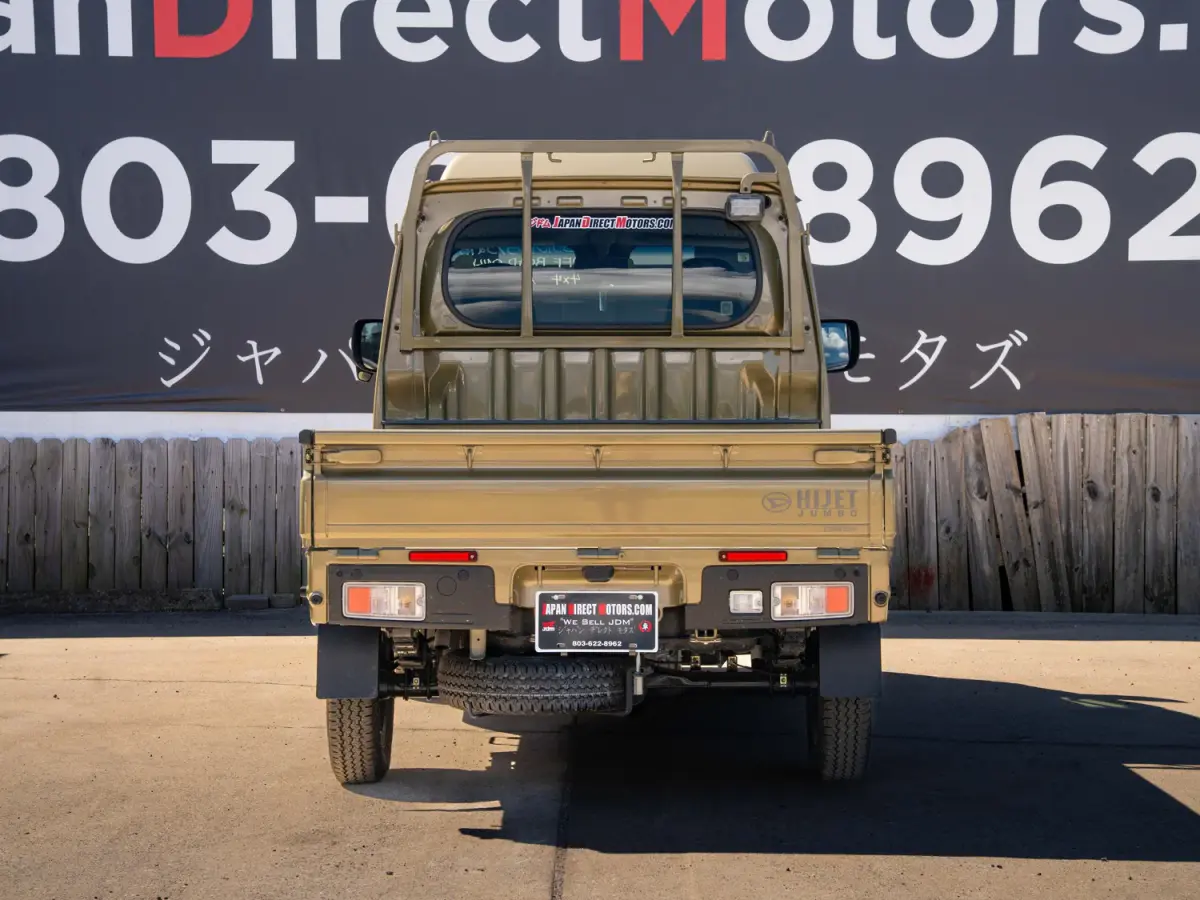 2024 Daihatsu Hijet, a green off-road Kei Truck, for sale at Japan Direct Motors in Irmo, SC (photo 8 of 12)