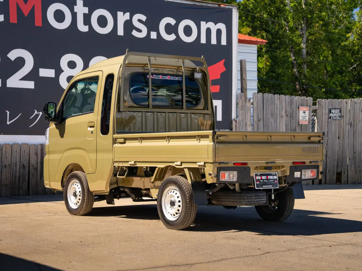2024 Daihatsu Hijet, a green off-road Kei Truck, for sale at Japan Direct Motors in Irmo, SC (photo 9 of 12)