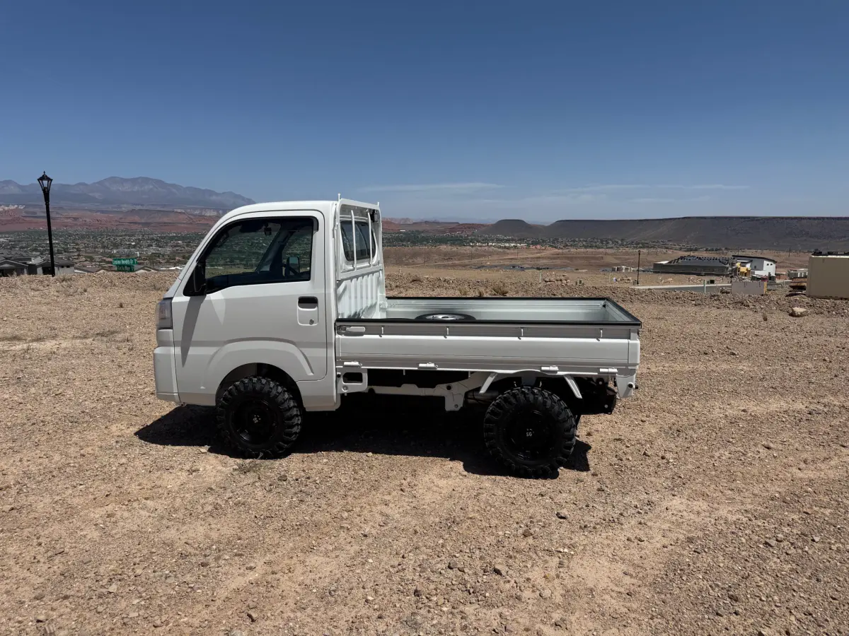 2024 Daihatsu Hijet, a whiteout off-road Kei Truck, for sale at Mini Monsters USA in St. George, UT (photo 3 of 12)