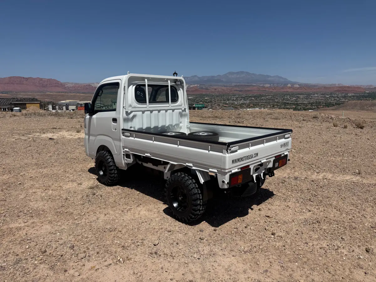 2024 Daihatsu Hijet, a whiteout off-road Kei Truck, for sale at Mini Monsters USA in St. George, UT (photo 5 of 12)