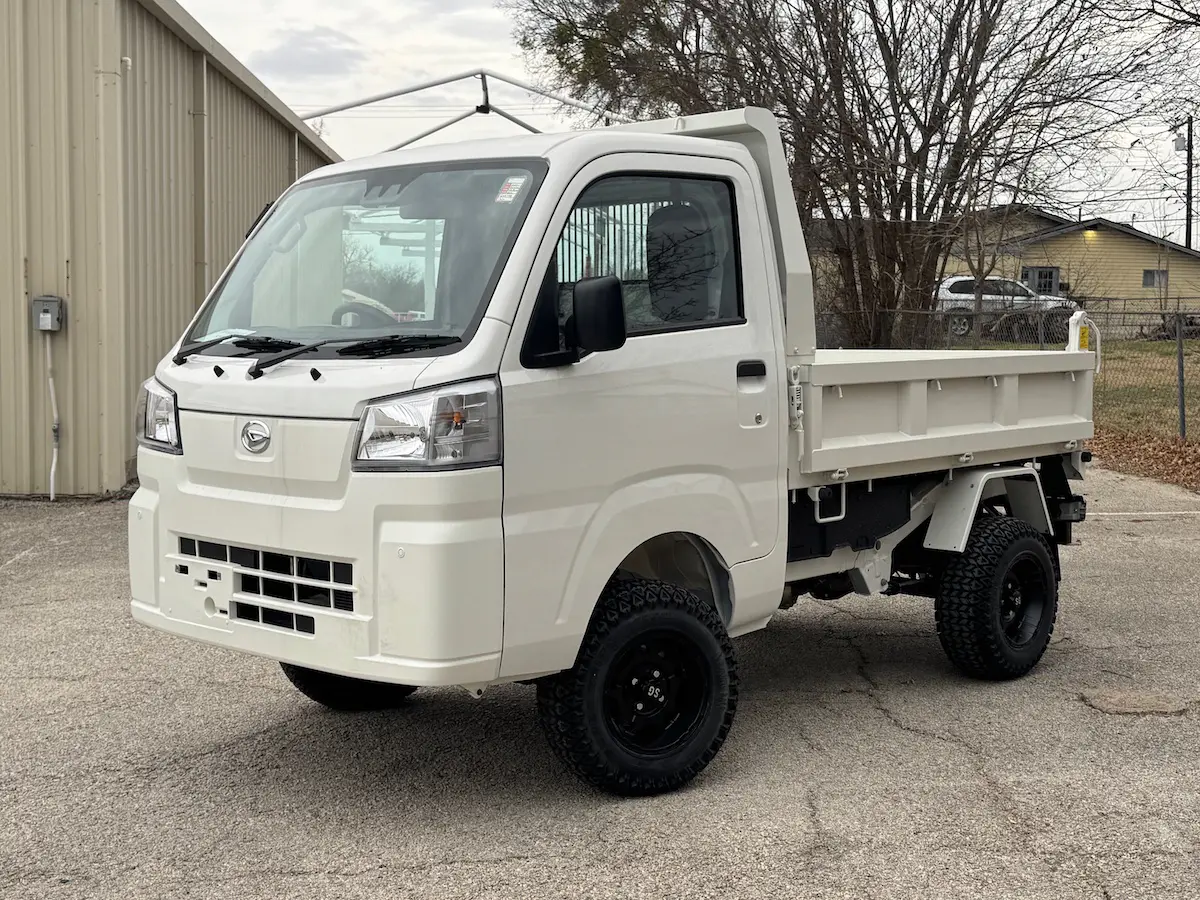 2025 Daihatsu Hijet HD Dump, Automatic 4x4, a white off-road Kei Truck, for sale at Weatherford Mini Trucks in Weatherford, TX (photo 3 of 5)