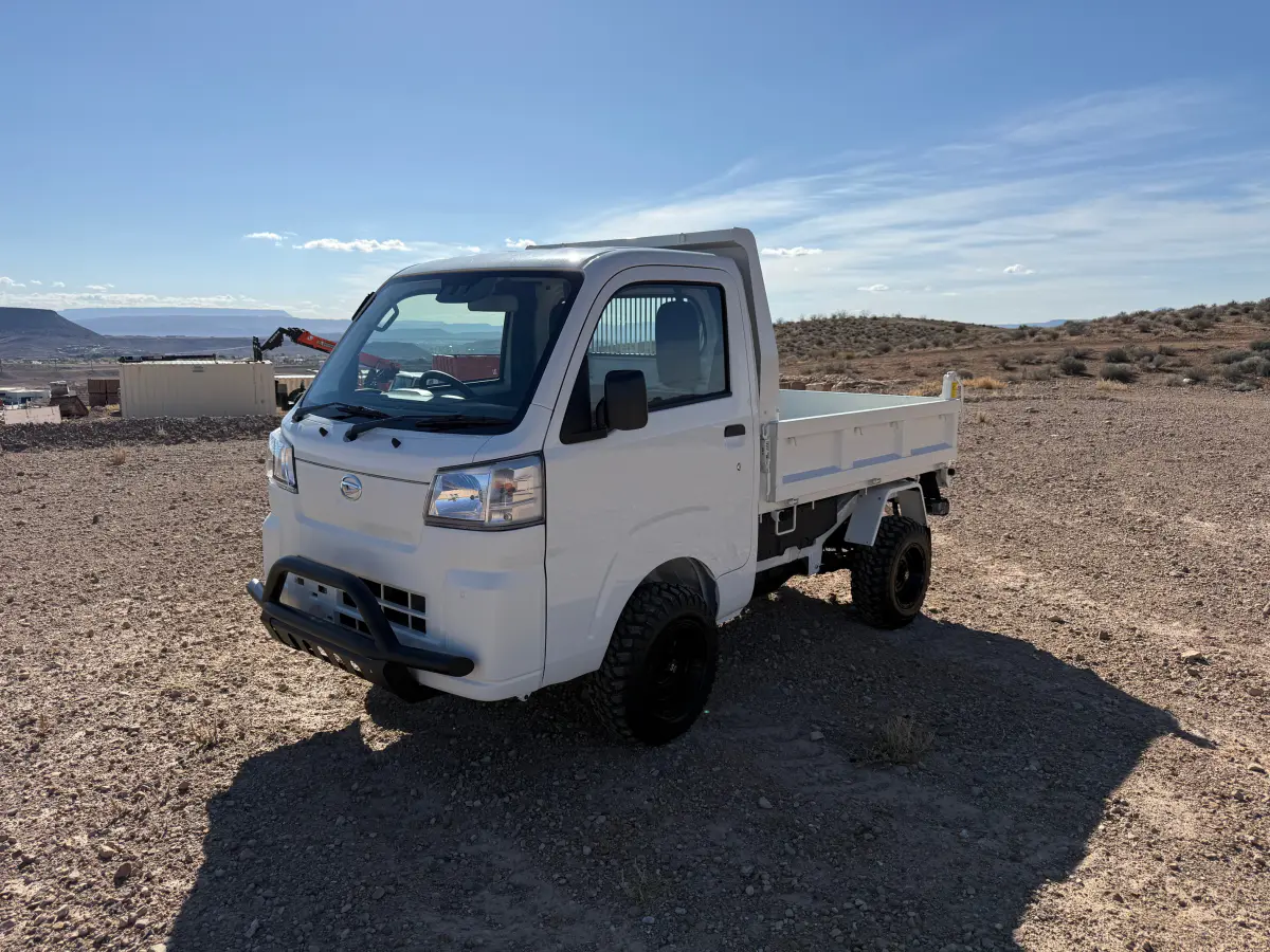 2025 Daihatsu Hijet HD Dump, a whiteout off-road Kei Truck, for sale at Mini Monsters USA in St. George, UT (photo 4 of 12)