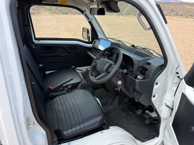 2025 Daihatsu Hijet HD Dump, a whiteout off-road Kei Truck, for sale at Mini Monsters USA in St. George, UT (photo 11 of 12)