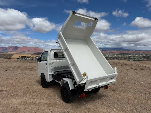 2025 Daihatsu Hijet HD Dump, a whiteout off-road Kei Truck, for sale at Mini Monsters USA in St. George, UT (photo 2 of 12)