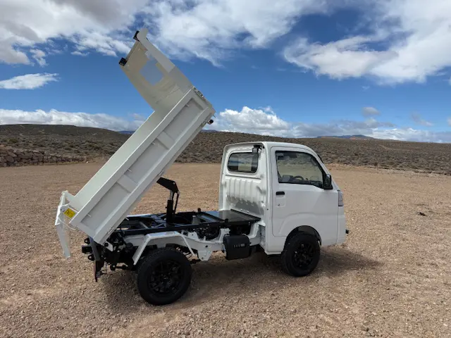 2025 Daihatsu Hijet HD Dump, a whiteout off-road Kei Truck, for sale at Mini Monsters USA in St. George, UT (photo 4 of 12)