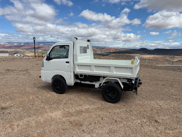 2025 Daihatsu Hijet HD Dump, a whiteout off-road Kei Truck, for sale at Mini Monsters USA in St. George, UT (photo 5 of 12)
