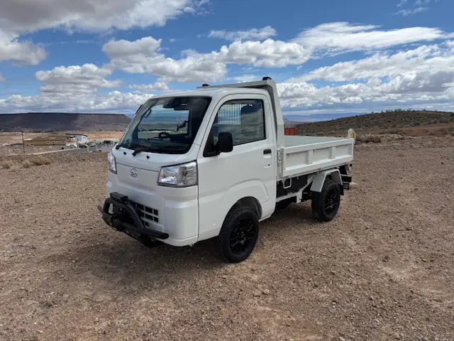 2025 Daihatsu Hijet HD Dump, a whiteout off-road Kei Truck, for sale at Mini Monsters USA in St. George, UT (photo 6 of 12)