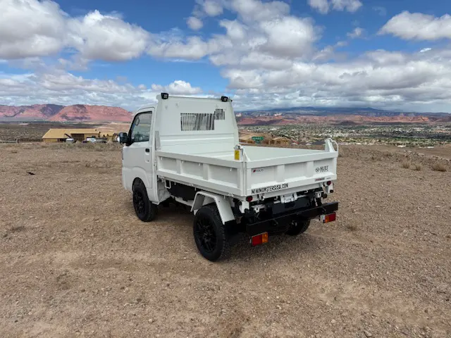 2025 Daihatsu Hijet HD Dump, a whiteout off-road Kei Truck, for sale at Mini Monsters USA in St. George, UT (photo 7 of 12)