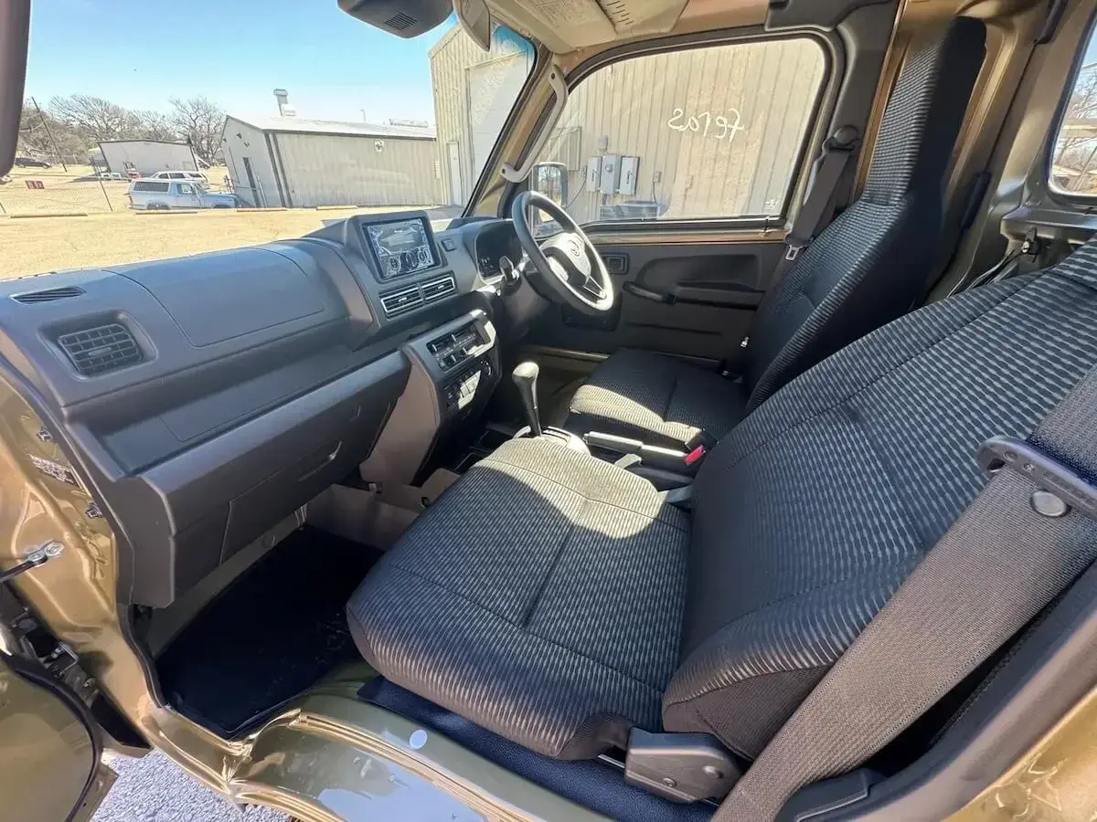 2025 Daihatsu Hijet Jumbo Automatic Farming Package, a khaki green off-road Kei Truck, for sale at Weatherford Mini Trucks in Weatherford, TX (photo 4 of 8)