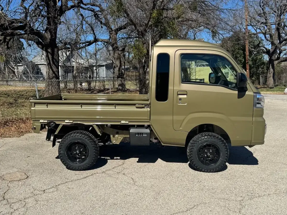 2025 Daihatsu Hijet Jumbo Farming Package Automatic, a khaki green off-road Kei Truck, for sale at Weatherford Mini Trucks in Weatherford, TX (photo 5 of 9)