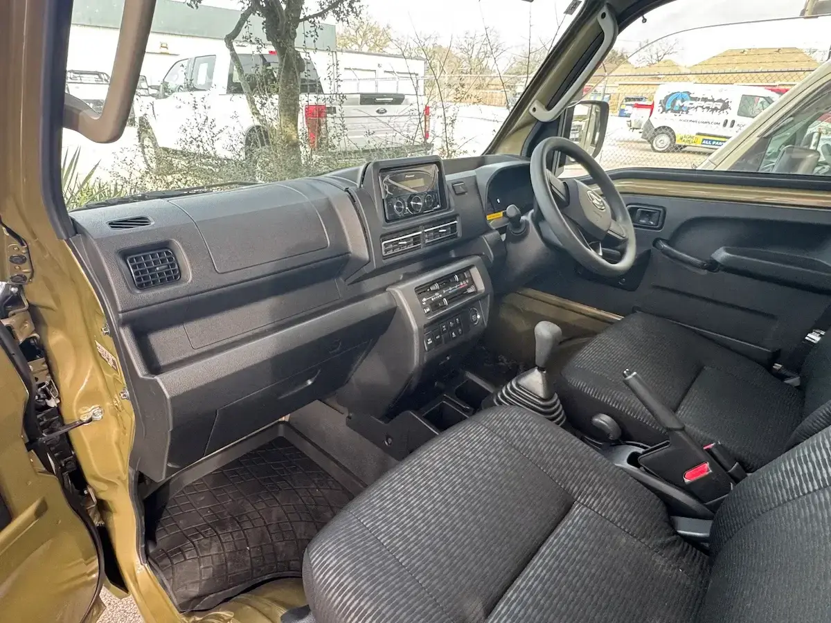 2025 Daihatsu Hijet Jumbo-Farming Package, a khaki green off-road Kei Truck, for sale at Weatherford Mini Trucks in Weatherford, TX (photo 10 of 10)
