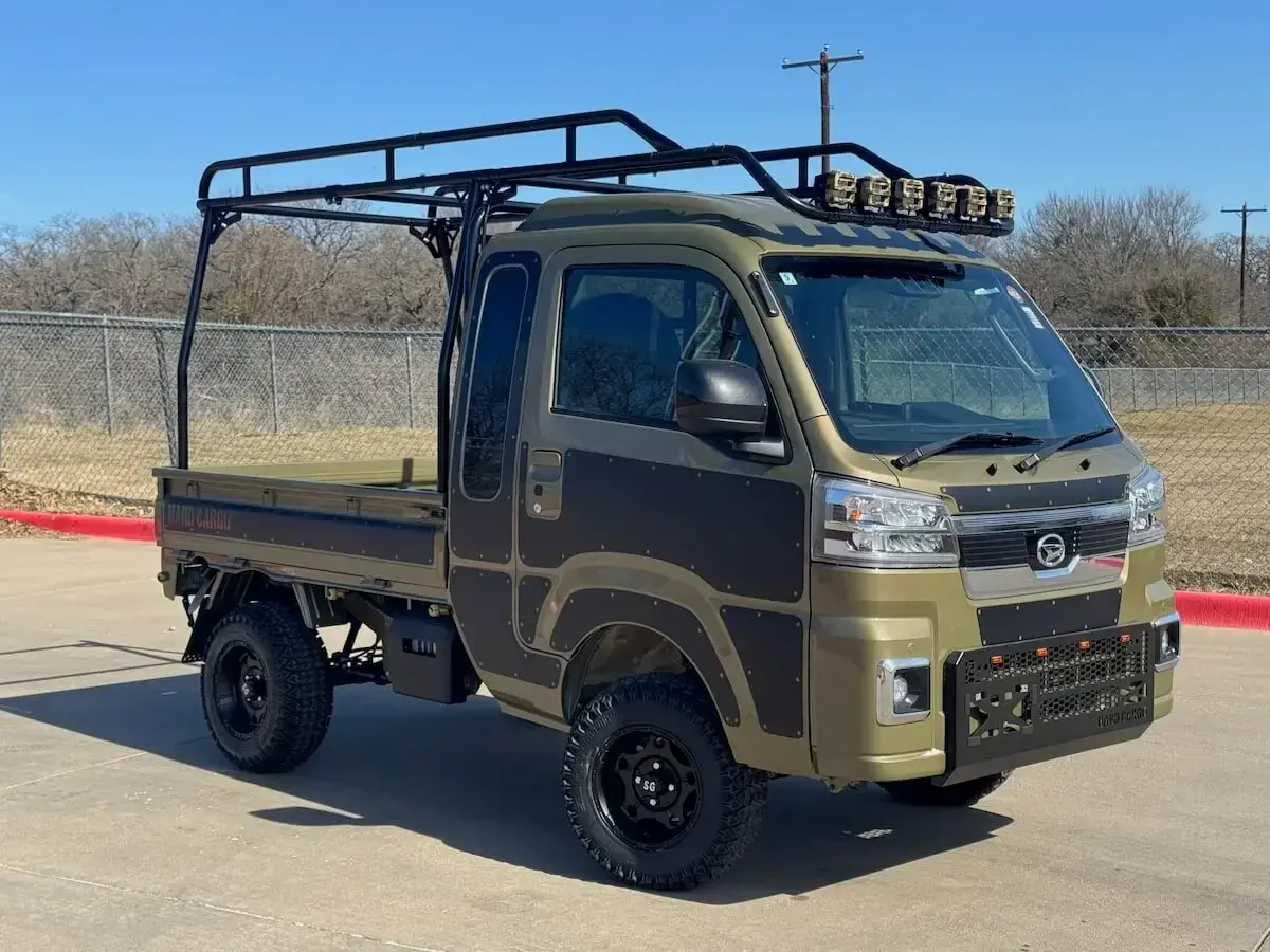 2025 Daihatsu Hijet Jumbo Hard Cargo Edition, a khaki green off-road Kei Truck, for sale at Weatherford Mini Trucks in Weatherford, TX (photo 1 of 12)
