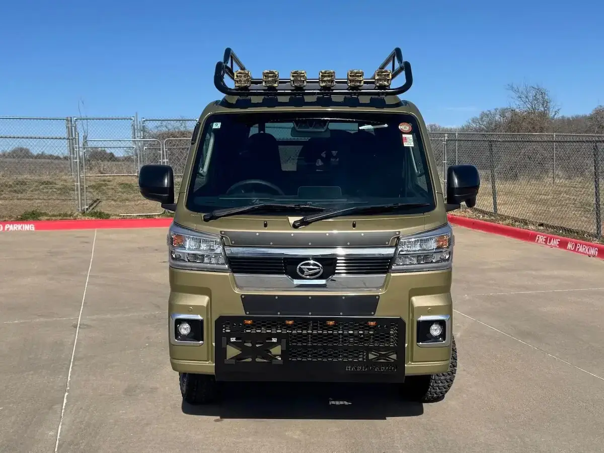 2025 Daihatsu Hijet Jumbo Hard Cargo Edition, a khaki green off-road Kei Truck, for sale at Weatherford Mini Trucks in Weatherford, TX (photo 2 of 12)