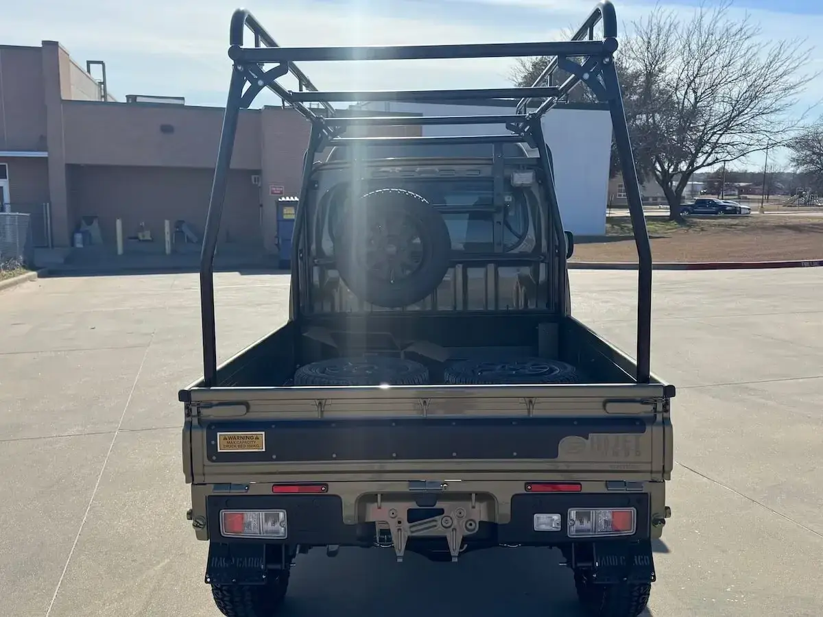 2025 Daihatsu Hijet Jumbo Hard Cargo Edition, a khaki green off-road Kei Truck, for sale at Weatherford Mini Trucks in Weatherford, TX (photo 3 of 12)