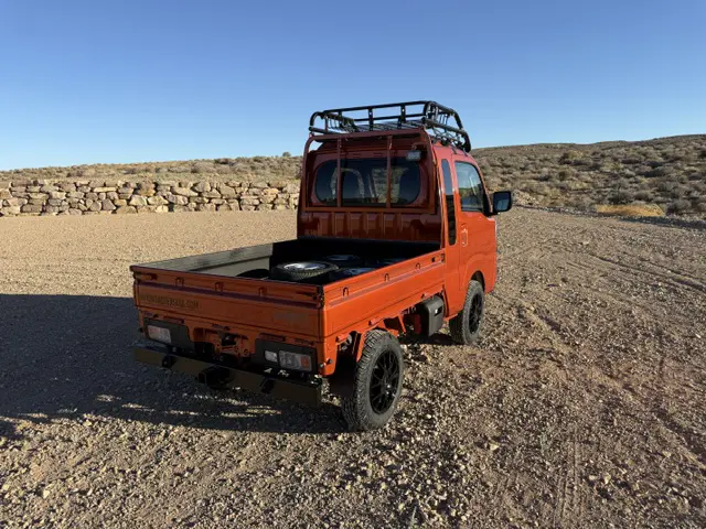 2025 Daihatsu Hijet Jumbo, a desert orange off-road Kei Truck, for sale at Mini Monsters USA in St. George, UT (photo 4 of 12)