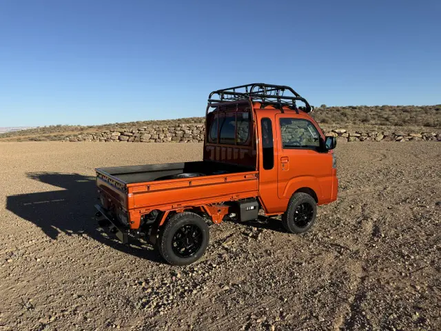 2025 Daihatsu Hijet Jumbo, a desert orange off-road Kei Truck, for sale at Mini Monsters USA in St. George, UT (photo 5 of 12)
