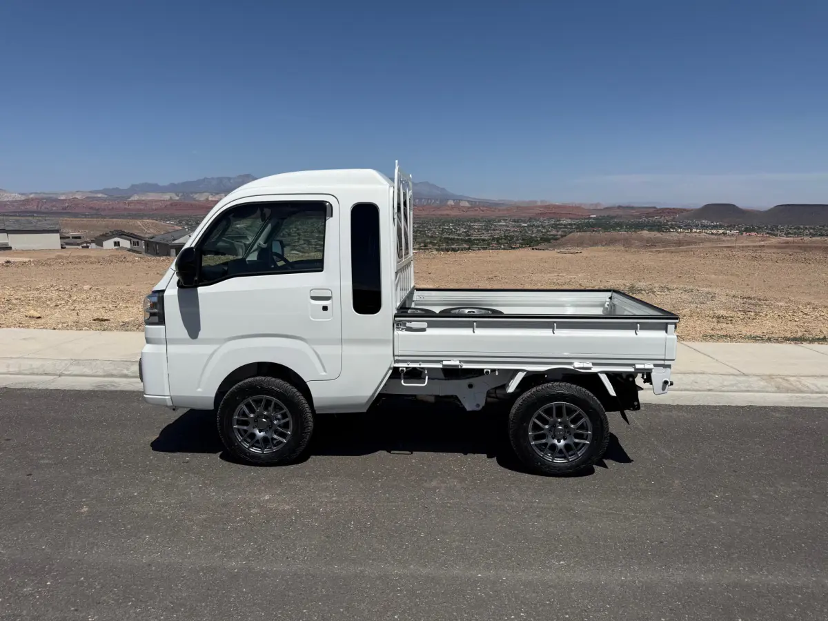 2025 Daihatsu Hijet Jumbo, a whiteout off-road Kei Truck, for sale at Mini Monsters USA in St. George, UT (photo 1 of 12)