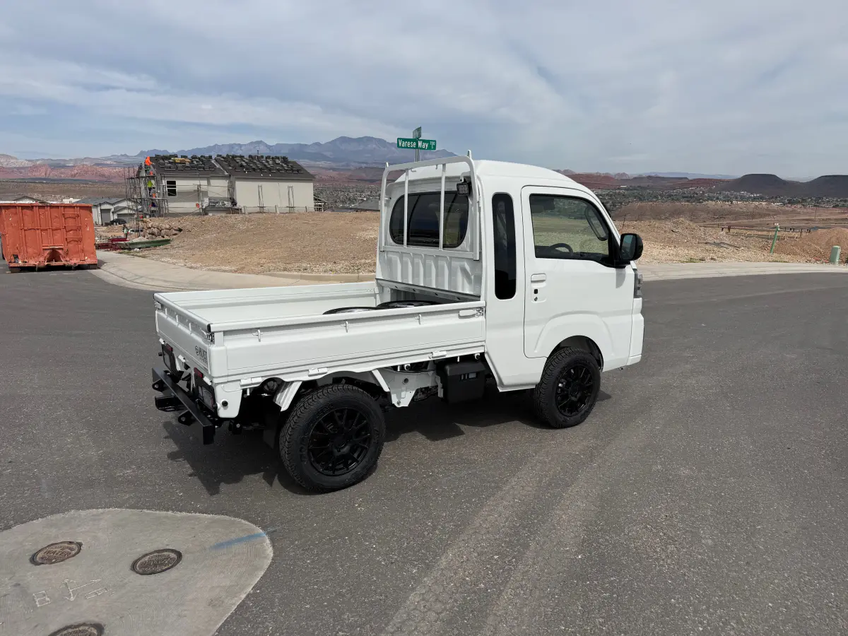 2025 Daihatsu Hijet Jumbo, a whiteout off-road Kei Truck, for sale at Mini Monsters USA in St. George, UT (photo 2 of 12)