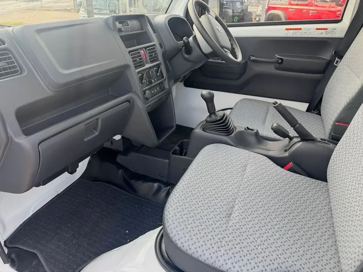2025 Suzuki Carry Scissor/Dump Bed, a white off-road Kei Truck, for sale at Weatherford Mini Trucks in Weatherford, TX (photo 10 of 12)