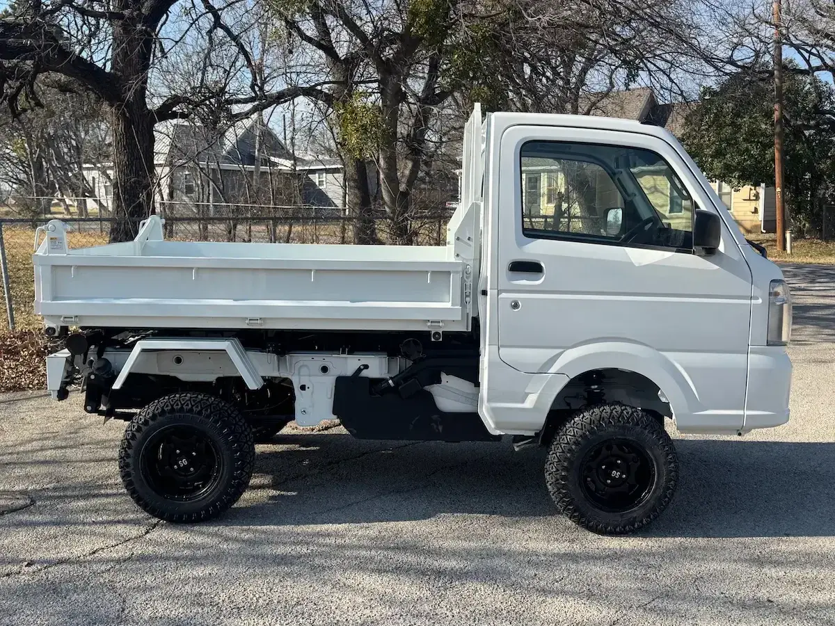 2025 Suzuki Carry Scissor/Dump Bed, a white off-road Kei Truck, for sale at Weatherford Mini Trucks in Weatherford, TX (photo 2 of 12)