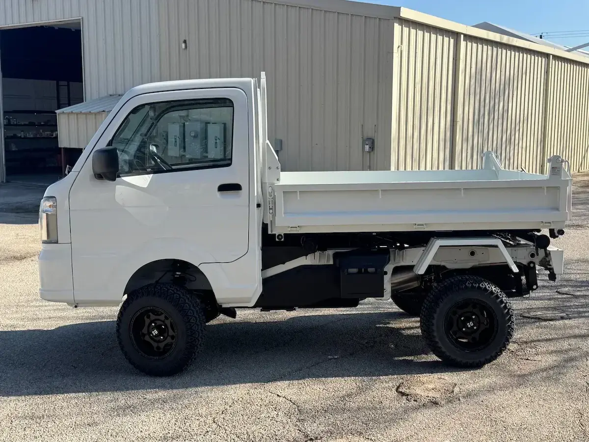 2025 Suzuki Carry Scissor/Dump Bed, a white off-road Kei Truck, for sale at Weatherford Mini Trucks in Weatherford, TX (photo 4 of 12)