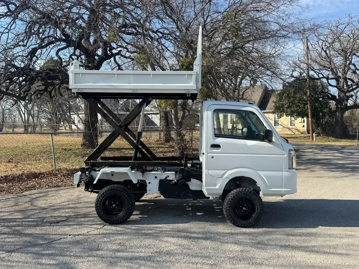2025 Suzuki Carry Scissor/Dump Bed, a white off-road Kei Truck, for sale at Weatherford Mini Trucks in Weatherford, TX (photo 6 of 12)