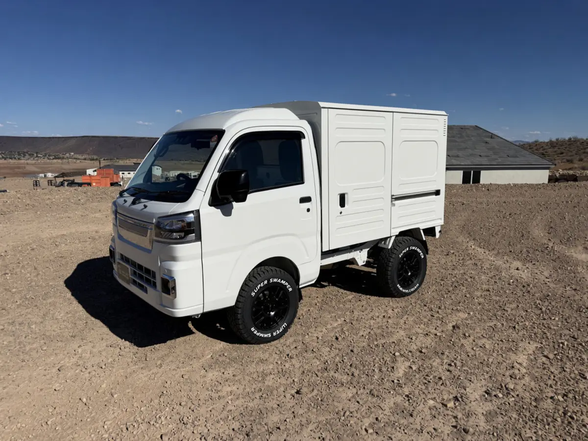 2026 Daihatsu Hijet Box Truck, a white off-road Kei Truck, for sale at Mini Monsters USA in St. George, UT (photo 1 of 12)