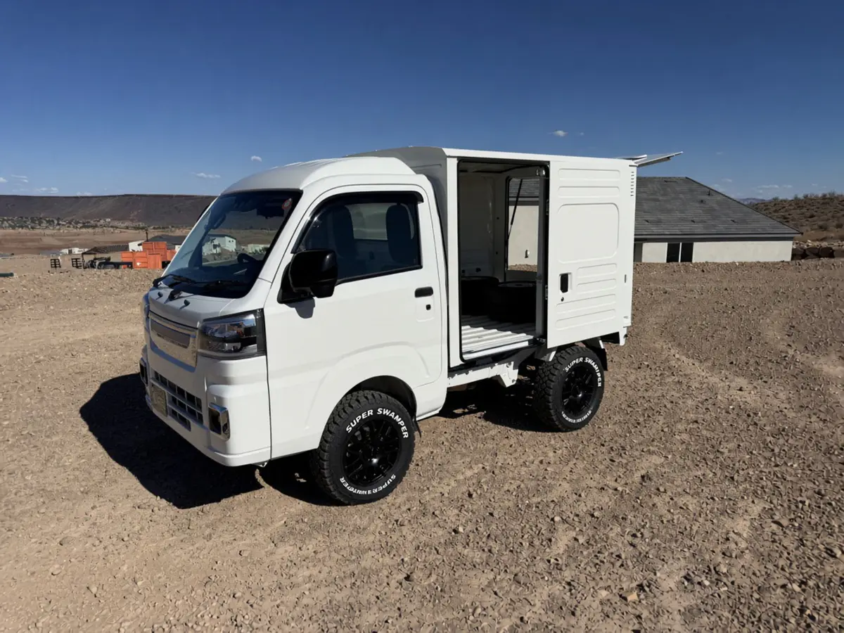 2026 Daihatsu Hijet Box Truck, a white off-road Kei Truck, for sale at Mini Monsters USA in St. George, UT (photo 3 of 12)