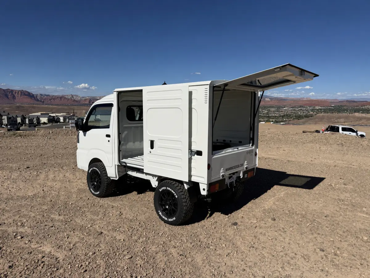 2026 Daihatsu Hijet Box Truck, a white off-road Kei Truck, for sale at Mini Monsters USA in St. George, UT (photo 6 of 12)
