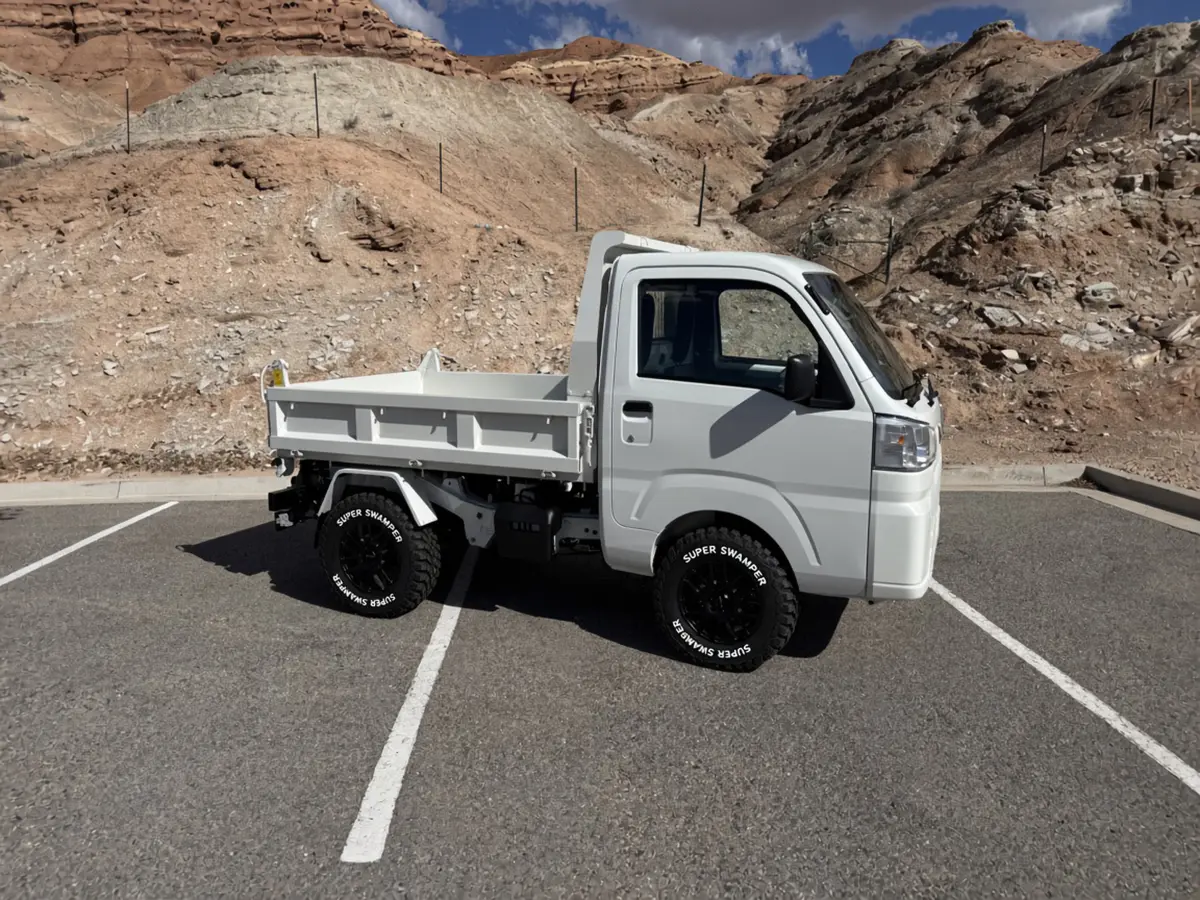 2026 Daihatsu Hijet HD Dump, a white off-road Kei Truck, for sale at Mini Monsters USA in St. George, UT (photo 4 of 12)