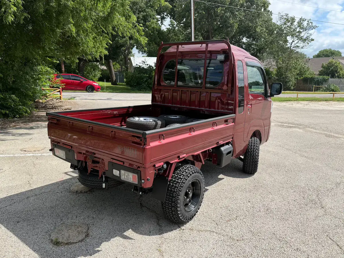 2026 Daihatsu Hijet Jumbo Cab Farming Package, a red off-road Kei Truck, for sale at Weatherford Mini Trucks in Weatherford, TX (photo 3 of 12)
