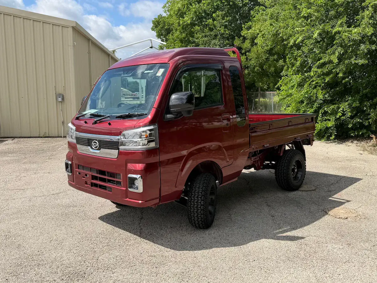 2026 Daihatsu Hijet Jumbo Cab Farming Package, a red off-road Kei Truck, for sale at Weatherford Mini Trucks in Weatherford, TX (photo 6 of 12)