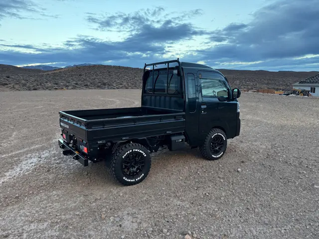 2026 Daihatsu Hijet Jumbo, a black off-road Kei Truck, for sale at Mini Monsters USA in St. George, UT (photo 4 of 12)